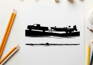 Silhouette of a pickup truck towing a boat on a trailer by the water
