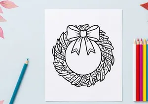 Christmas wreath line art illustration with a decorative bow for holiday coloring pages.