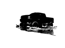 Silhouette of a pickup truck driving through water