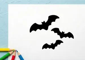 Silhouettes of Flying Bats in Night Sky for Halloween or Horror Themes