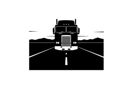 A silhouette of a semi truck driving down a deserted highway at sunset
