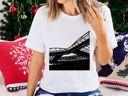 Black and white photograph of a large industrial or sports venue roof structure