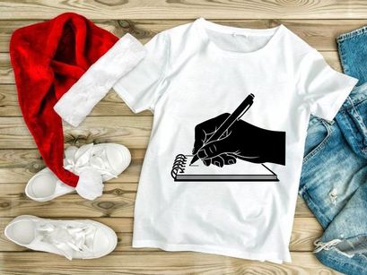 Hand writing in notebook with black pen on spiral bound paper