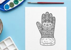 Winter mitten coloring page with intricate mandala patterns and fur cuff for Christmas