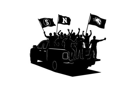 Silhouette of people celebrating on a car with flags