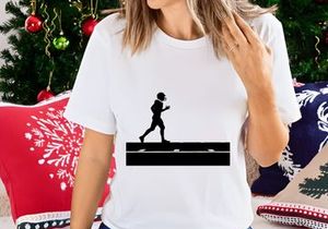 Silhouette of a football player running with the ball on a field
