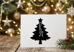 Black Christmas tree silhouette with star and ribbon bow isolated on white background