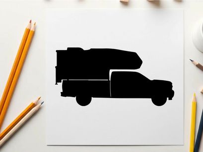 Silhouette of a delivery truck with cargo on top