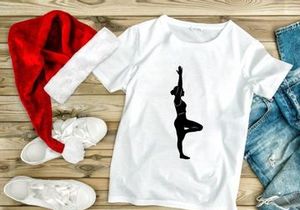 Woman Meditating in Tree Yoga Pose Silhouette