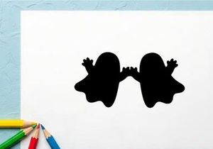 Silhouette of two children holding hands, playful and joyful scene