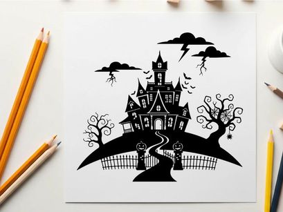 Spooky silhouette of a haunted house on a hill with trees and fence