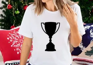 A black trophy cup on a white background with a spotlight shining down