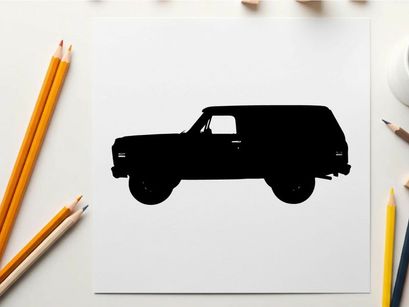 Silhouette of a black suv vehicle against a white background