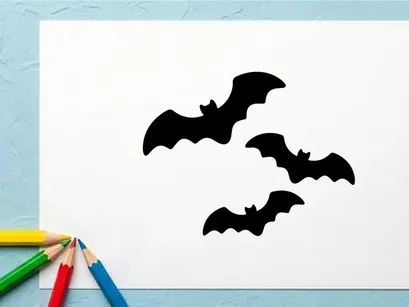 Silhouettes of Flying Bats in Night Sky for Halloween or Horror Themes
