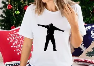 Silhouette of a man gesturing with outstretched arms