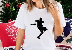 Soccer player kicking a ball in mid air with dynamic movement and energy