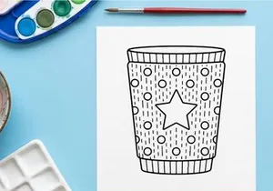 Christmas coffee cup outline drawing with star pattern for holiday coloring page design