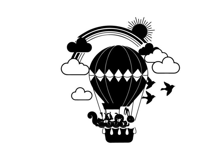 Hot air balloon silhouette with rainbow and clouds scene