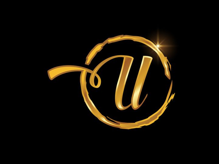 Golden color English hand-drawn alphabet in a brush circle on black background
