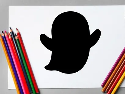 Silhouette of a cute cartoon baby face with ears and round head
