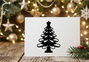 Black silhouette of a Christmas tree with a star topper on a white background.