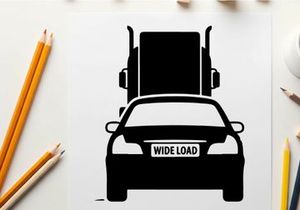 Silhouette of a car with oversized load on a flatbed truck