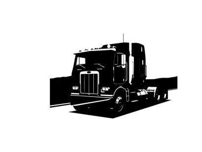 Silhouette of a large truck on the road with a scenic view