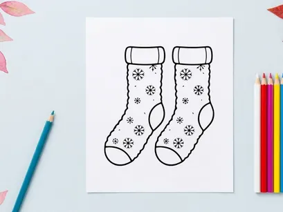 Pair of festive Christmas socks with snowflakes and ribbons for holiday celebrations