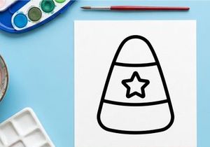Candy corn icon with star. Halloween sweet treat graphic symbol for autumn holiday design.