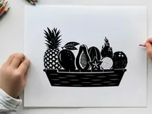Silhouette of fresh fruit in a woven basket