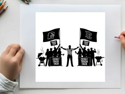 Silhouette of people holding michigan tech flags and grilling