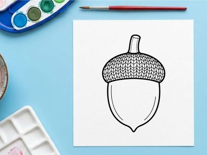 Close-up of an acorn with textured cap and smooth nut. Natural autumn theme for educational or nature projects.