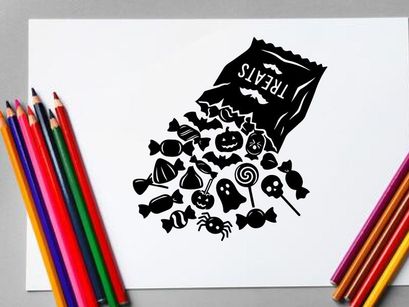 Black and white coffee bag spilling coffee beans with flowers and spoon