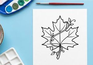 Elegant line art of a maple leaf with swirling details. Artistic botanical illustration for design projects.