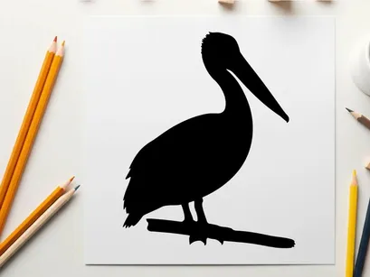 Silhouette of a pelican bird standing on a branch