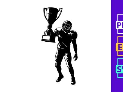 Victorious football player holding trophy in celebratory stance