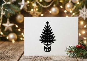 Christmas tree in a pot with a star topper, black and white hand drawn illustration.
