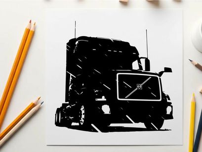 Silhouette of a large truck with a volvo front grille