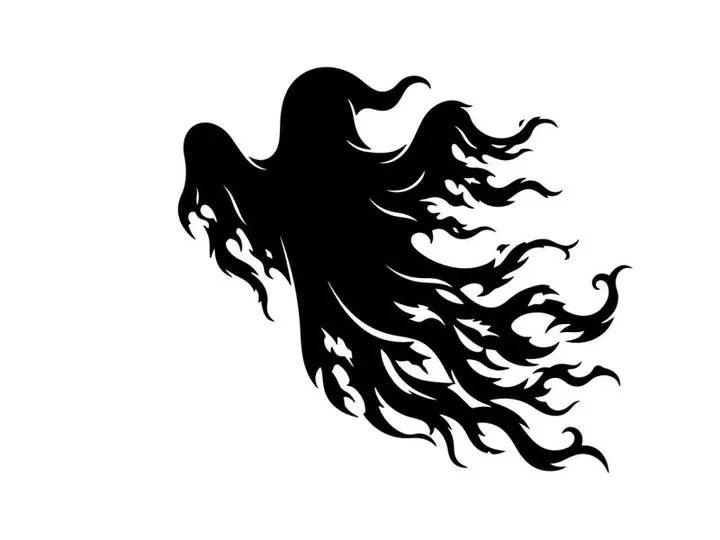 Silhouette of a Hummingbird with Flowing Wings in Flight