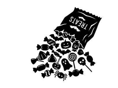 Black and white coffee bag spilling coffee beans with flowers and spoon