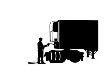 Silhouette of a man washing a semi truck with a hose preview picture