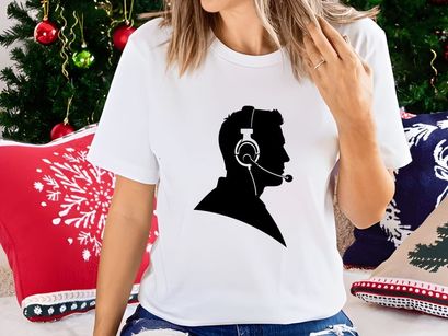 Silhouette of a man wearing a headset for customer support or call center services