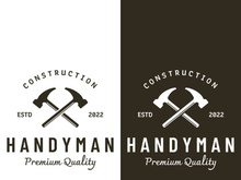 Vintage retro crossed hammers logo.