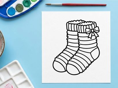 Cute striped baby socks with festive bow gift-ready for holiday celebrations and newborn photoshoots
