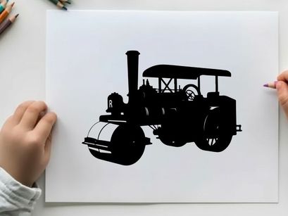 Silhouette of a vintage steam roller tractor
