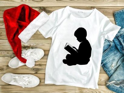 Boy Reading Book Silhouette