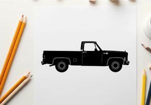Silhouette of a classic pickup truck with a long bed and two doors