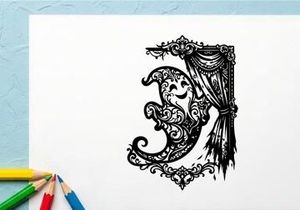 Elegant ornate letter 'J' with decorative curtain and frame