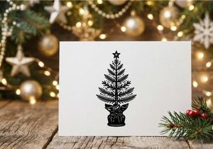Black and white hand drawn Christmas tree illustration with star topper on white background