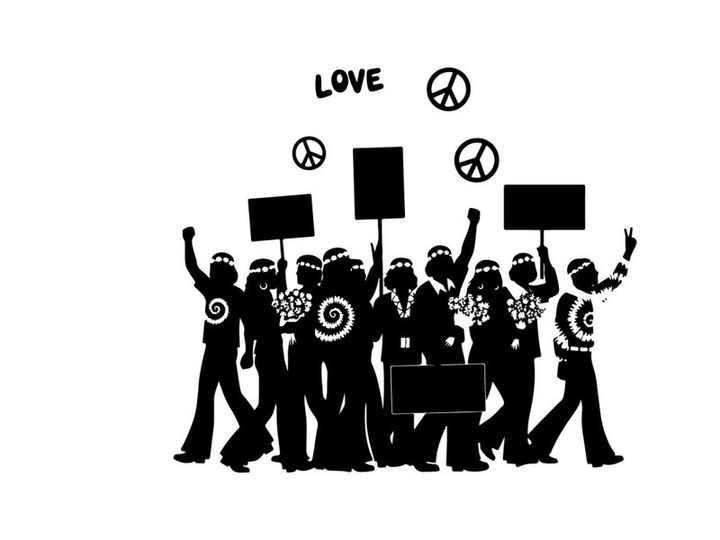 Peaceful protesters with signs and silhouette peace symbols